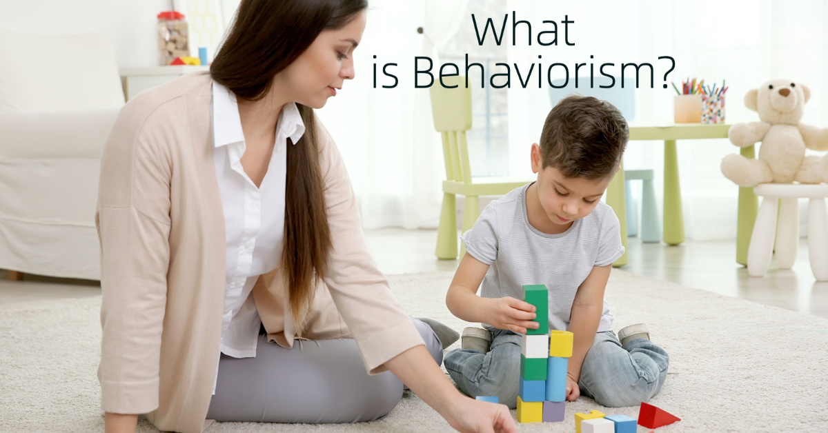 Adult working with child with text What is Behaviorism